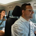 Man and woman in car during daytime